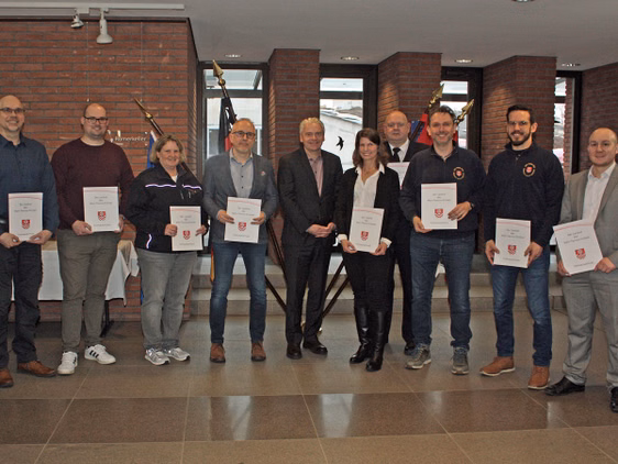 Gruppenfoto, zwei Frauen, acht Männer

