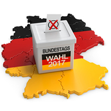 den Umriss von Deutschland in den Farben schwarz, rot und gelb, auf dem eine Wahlurne steht