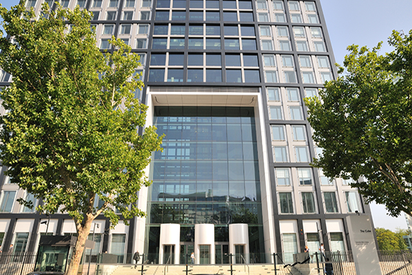 A skyscraper with glass front